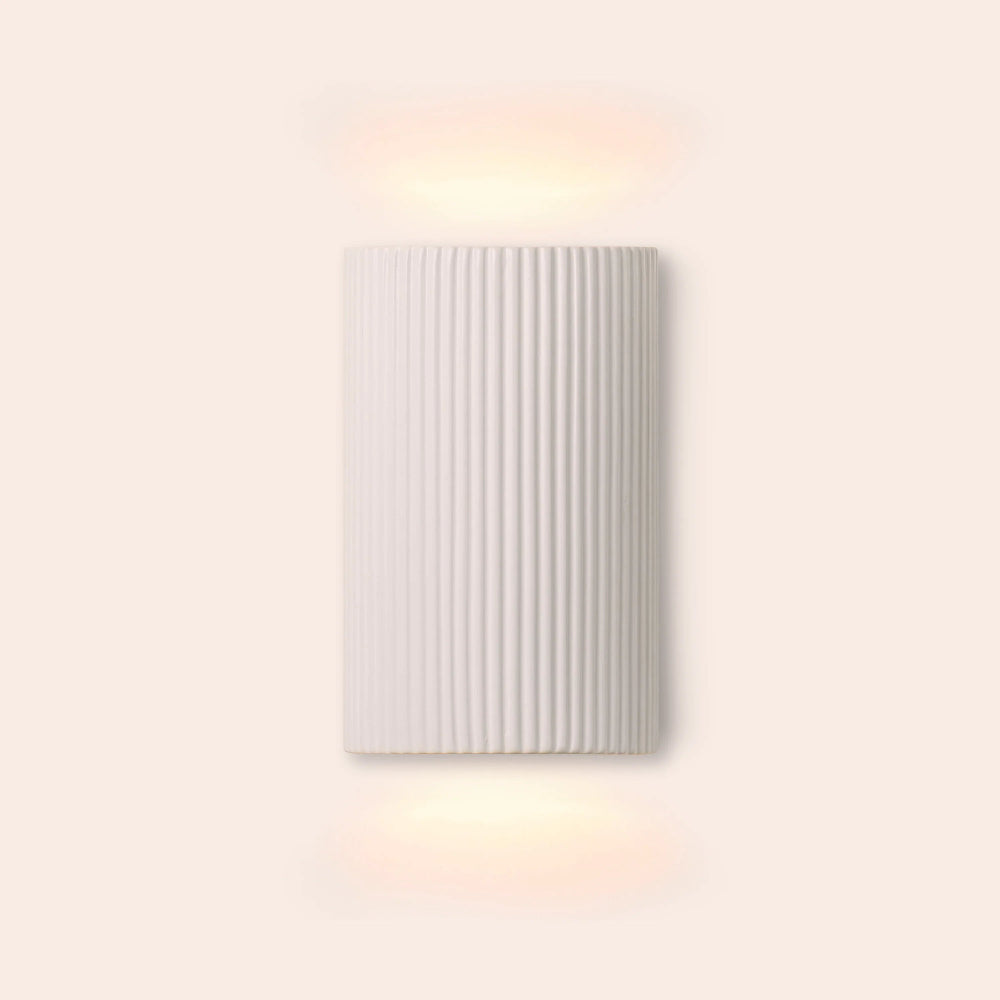 Front view of white ribbed ceramic wall light