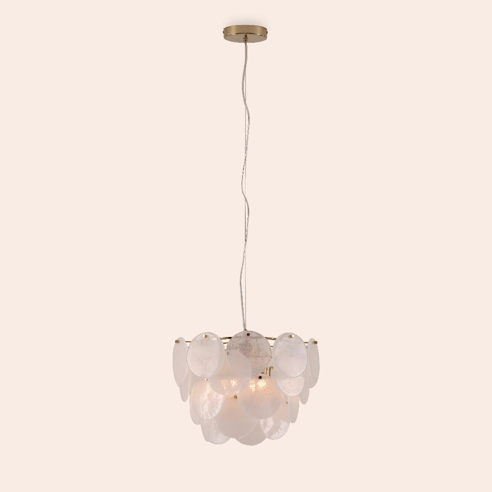 Modern pendant light with glass shades on a beige background