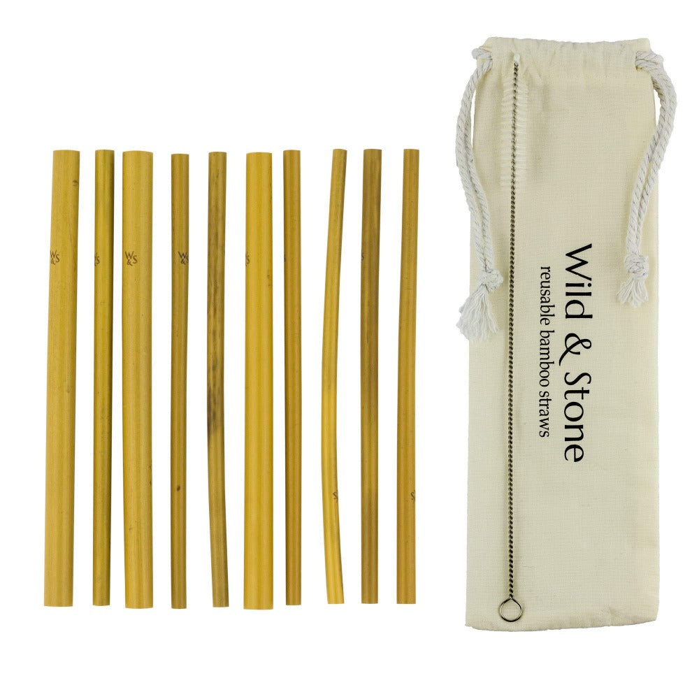 Set of reusable bamboo straws with a carrying pouch labeled 'Wild & Stone' on a white background.