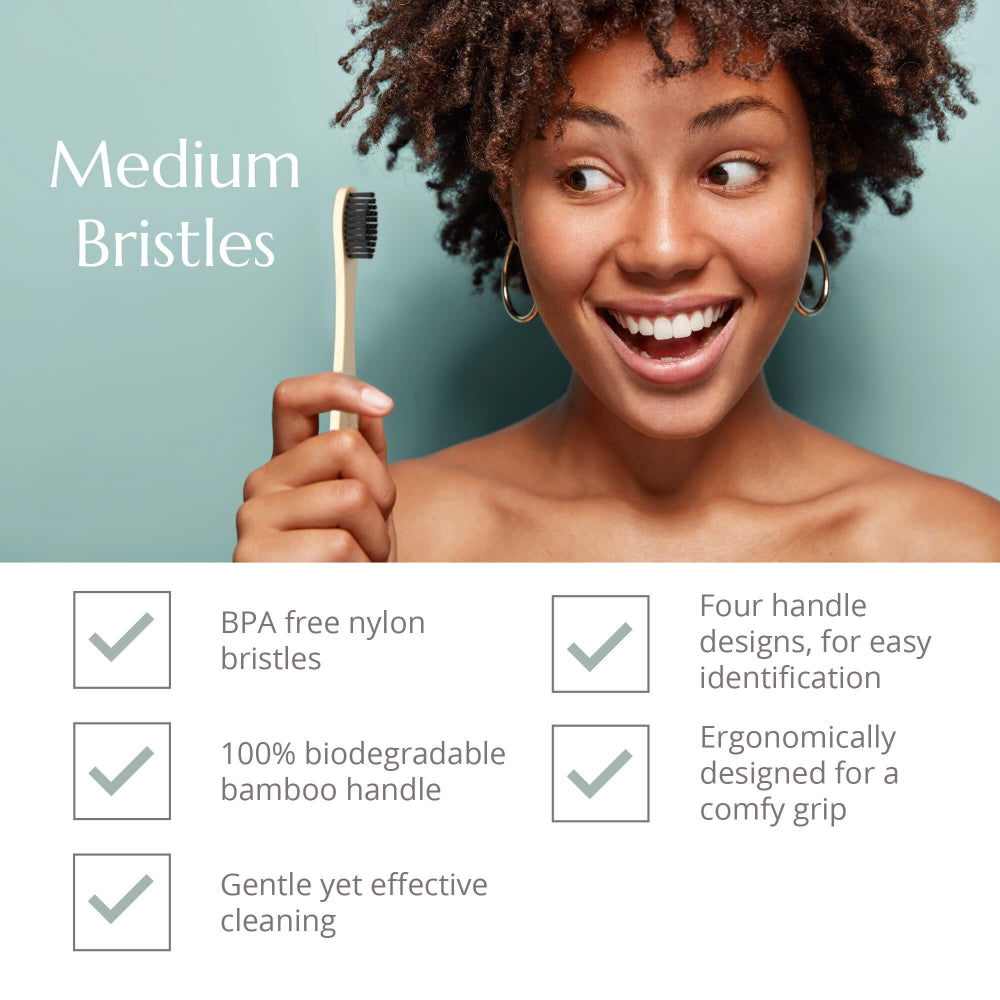 Woman holding a bamboo toothbrush with product features listed below on a light blue background