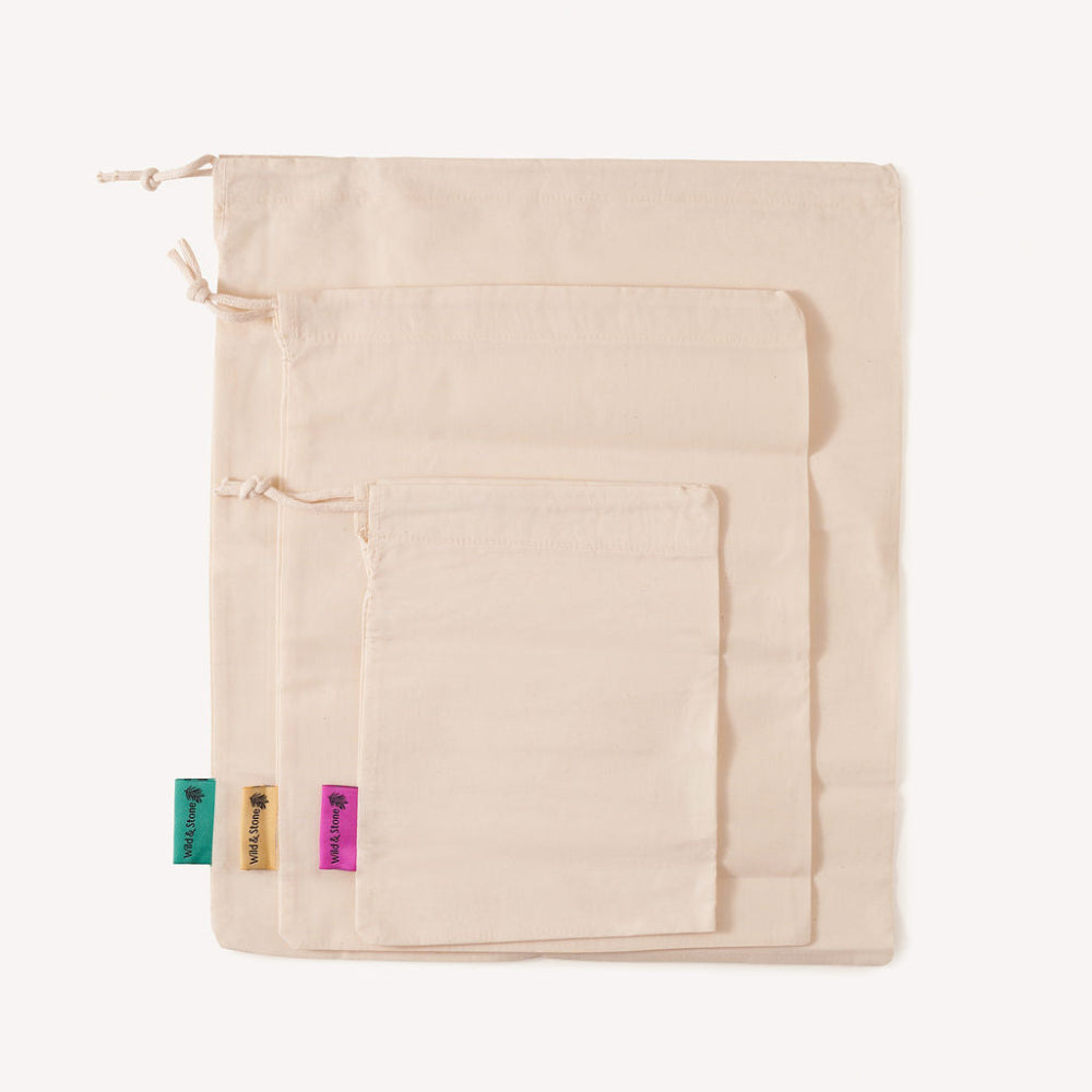 Reusable Produce bags with colourful labels on a white background