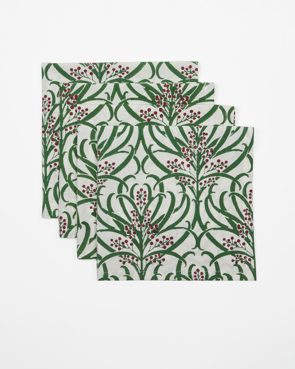 Set of four Rosie Dalia cotton napkins with green foliage and burgundy winter berry print.