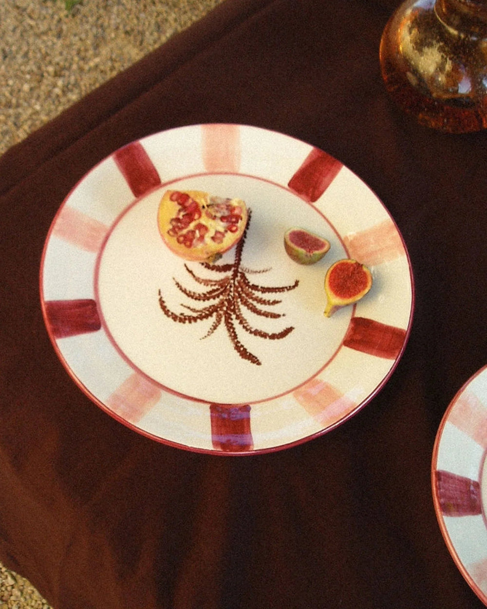 Palmera ceramic serving plates arranged on a dining table
