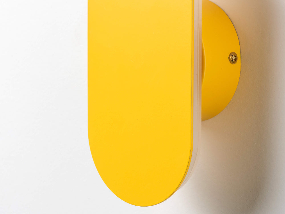 Side view of yellow mini diffuser wall light showing slim profile